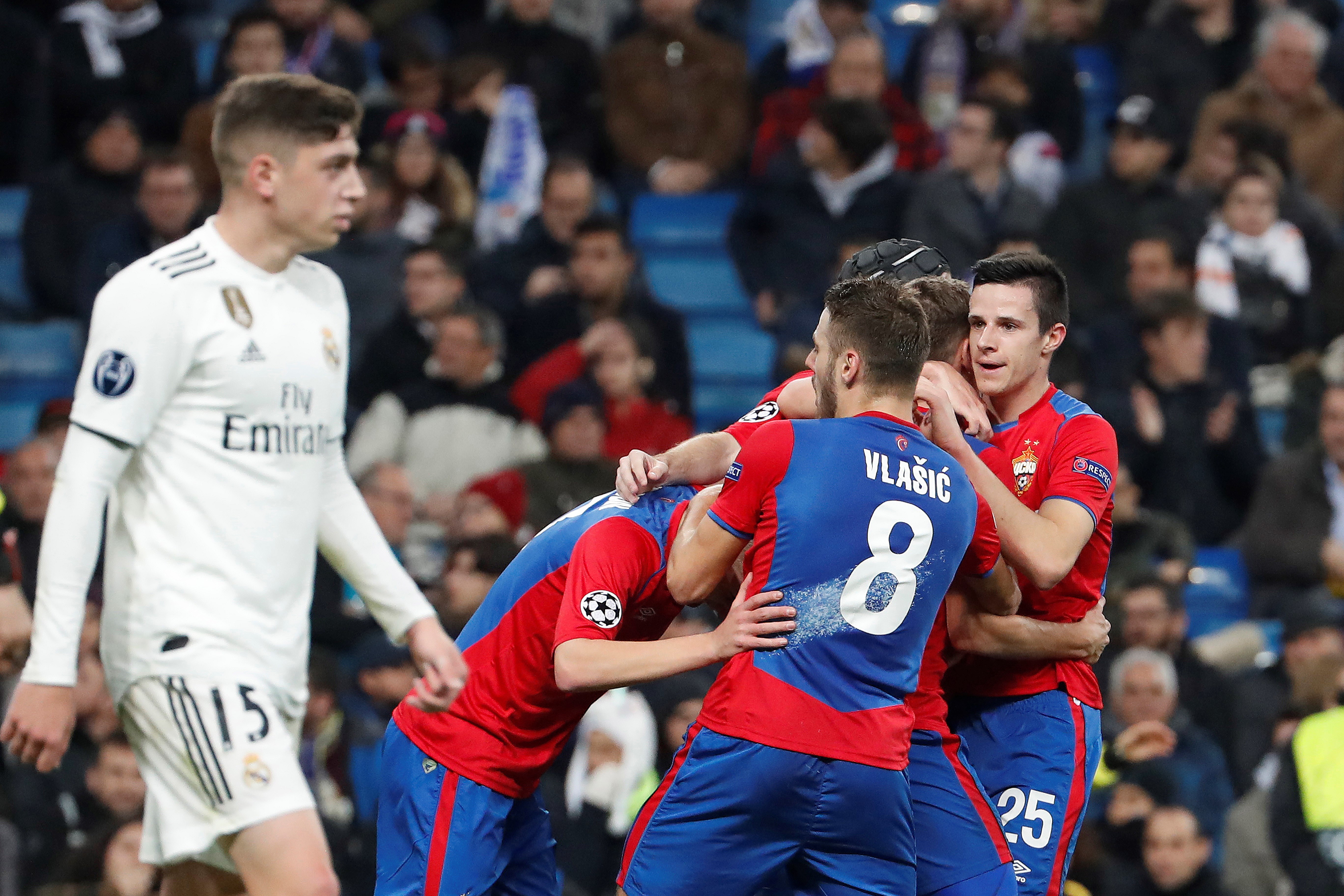 epa07226588 CSKA Moscow's players celebrate the 0-1 during the UEFA Champions League group G match between Real Madrid and CSKA Moscow at Santiago Bernabeu stadium in Madrid, Spain, 12 December 2018. EPA-EFE/J.P. Gandul