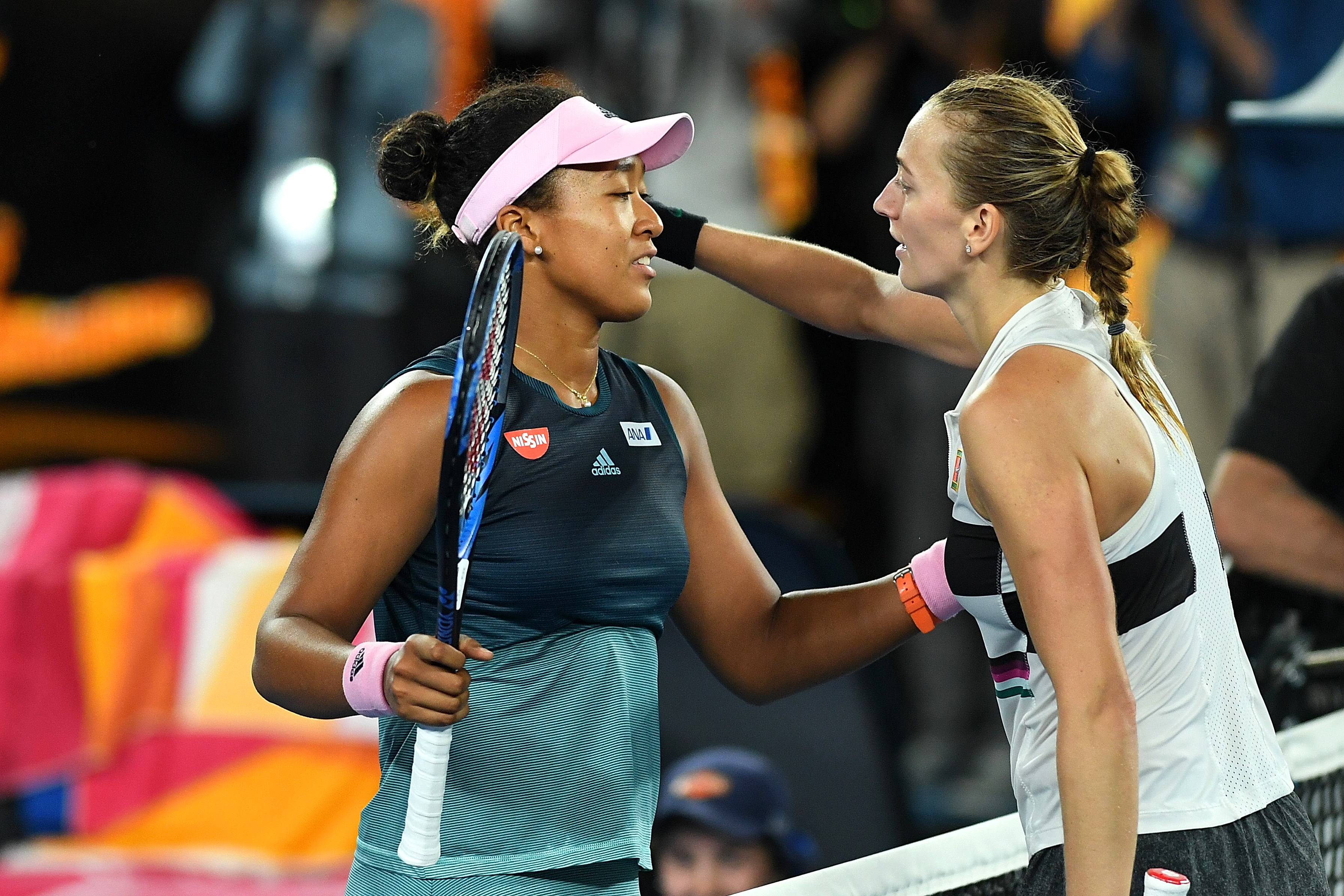 epa07321097 Petra Kvitova (R) of Czech Republic and Naomi Osaka (L) of Japan meet at the net after their women's singles final match at the Australian Open Grand Slam tennis tournament in Melbourne, Australia, 26 January 2019. EPA-EFE/LUKAS COCH EDITORIAL USE ONLY AUSTRALIA AND NEW ZEALAND OUT