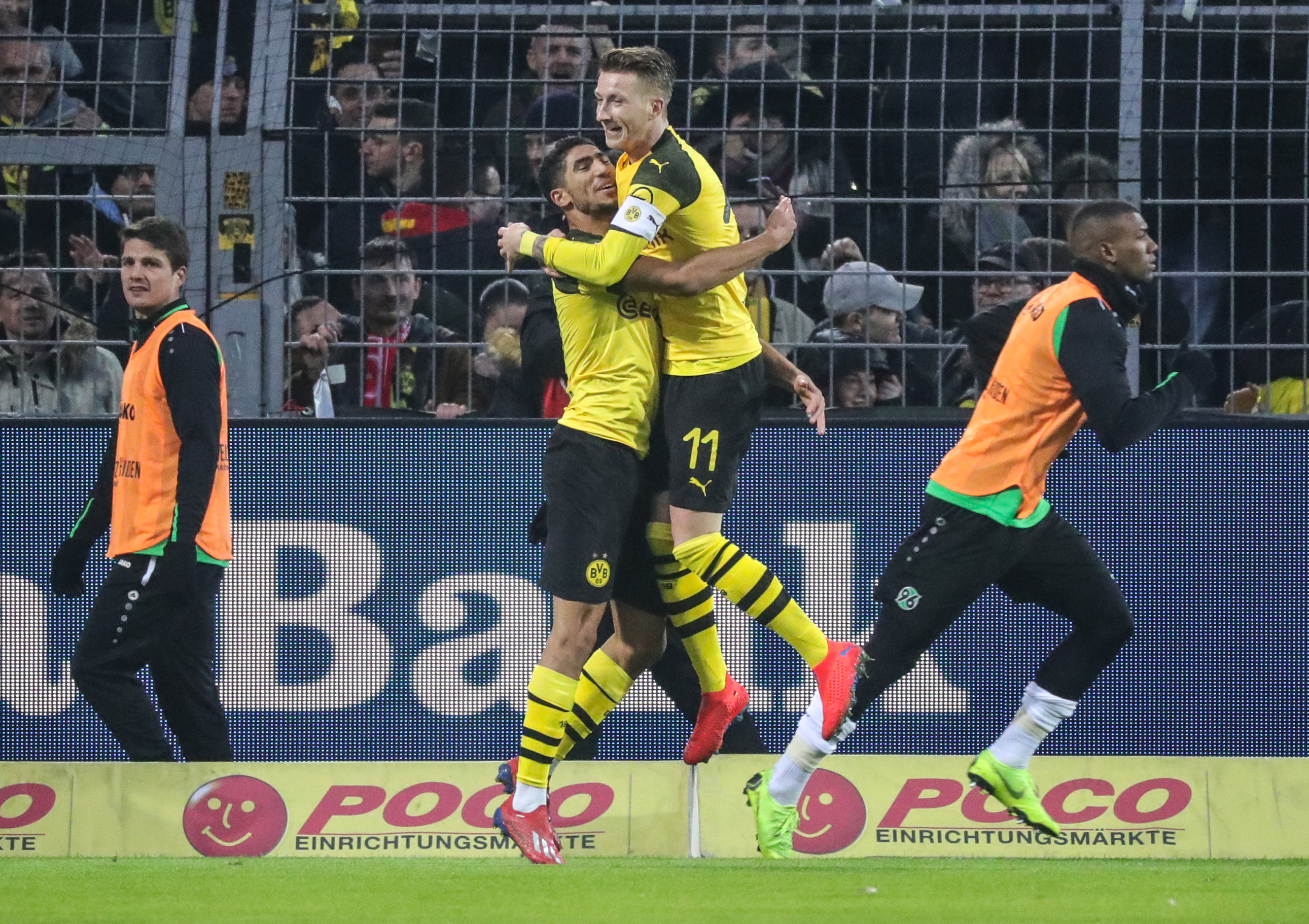 epa07322266 Dortmund's Marco Reus celebrate his goal with teammate Dortmund's Achraf Hakimi (L) during the German Bundesliga soccer match between Borussia Dortmund and Hannover 96 in Dortmund, Germany, 26 January 2019. EPA-EFE/ARMANDO BABANI CONDITIONS - ATTENTION: The DFL regulations prohibit any use of photographs as image sequences and/or quasi-video