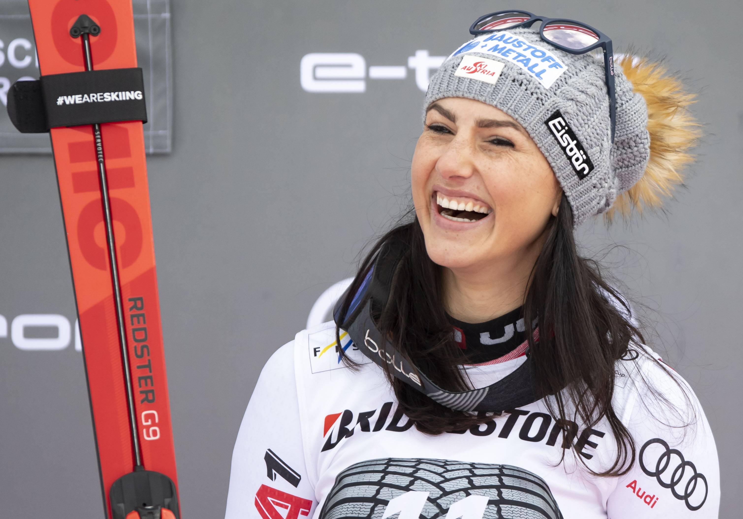 epa07324630 Winner Stephanie Venier of Austria celebrates on the podium for the Women's Downhill race at the FIS Alpine Skiing World Cup in Garmisch-Partenkirchen, Germany, 27 January 2019. EPA-EFE/LUKAS BARTH-TUTTAS