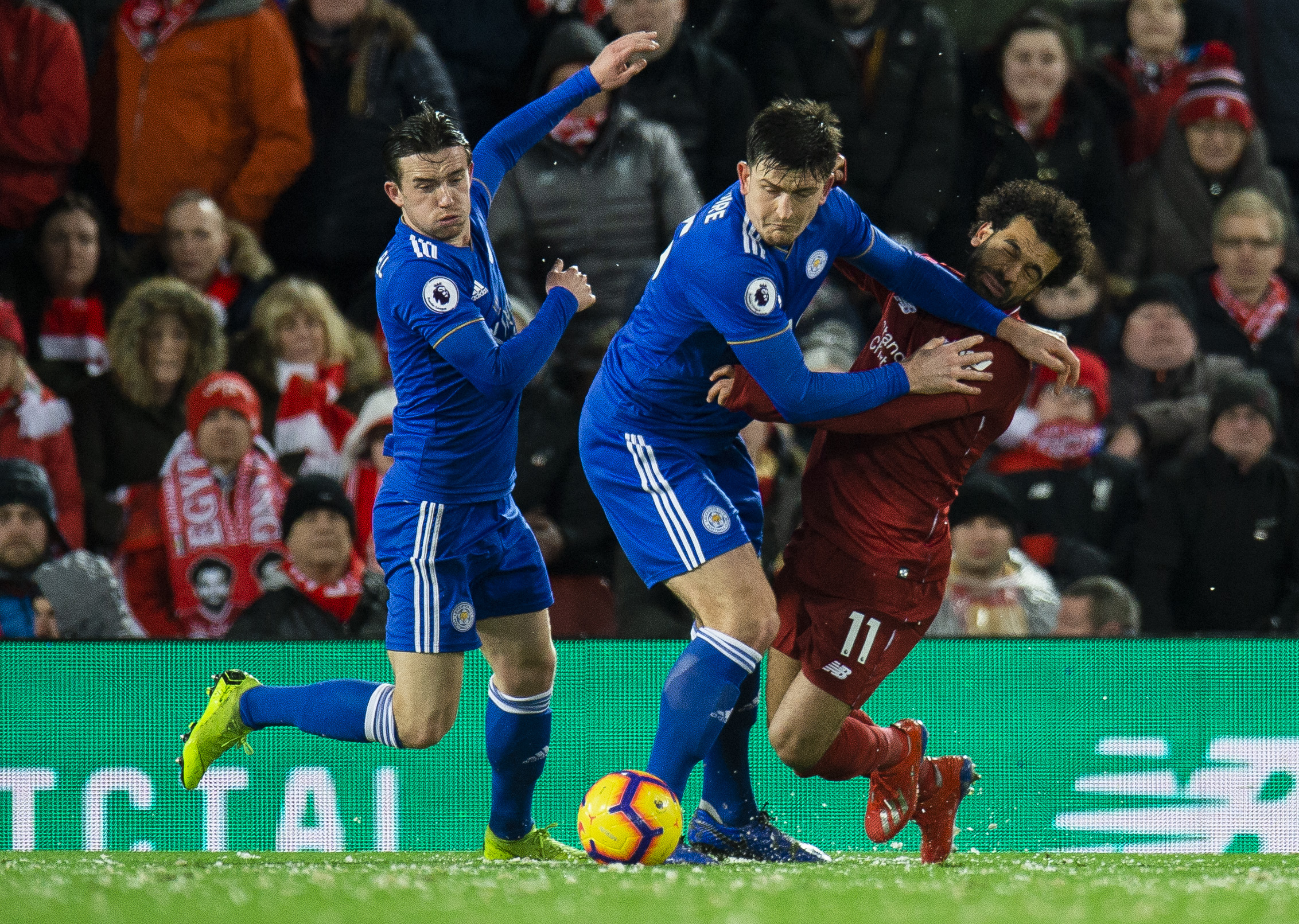 epa07332335 Leicester City's Harry Maguire (L) in action with Liverpool's Mohamed Salah (R) during the English Premier League soccer match between Liverpool and Leicester City and Burton Albion held at the Anfield in Liverpool, Britain, 30 January 2019. EPA-EFE/PETER POWELL EDITORIAL USE ONLY. No use with unauthorized audio, video, data, fixture lists, club/league logos or 'live' services. Online in-match use limited to 120 images, no video emulation. No use in betting, games or single club/league/player publications